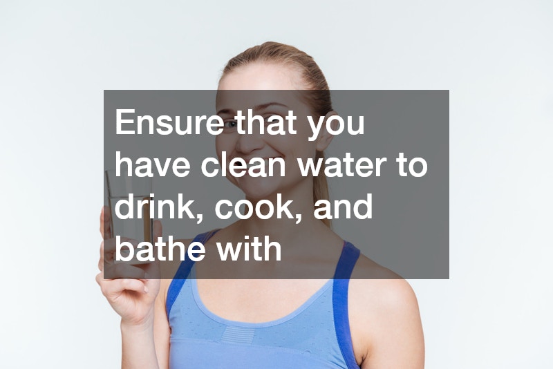 woman holding a glass of water